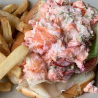 Lobster Roll. · Fresh lobster meat, celery, mayo on a torpedo roll or fresh bed of lettuce