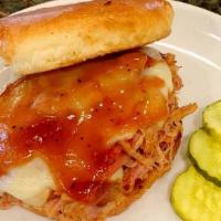Pulled Pork Sandwich · BBQ pulled pork, Swiss cheese, bulky roll
