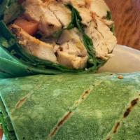 Thai Peanut Chicken Wrap · Grilled chicken, spinach, tomatoes, cucumbers, peanut sauce, spinach wrap