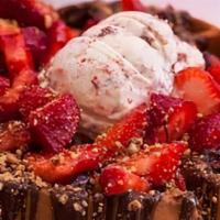 Fruit Attack Waffle · Nutella, strawberries, mixed berries and banana. Served with choice of nutella, bueno or cho...