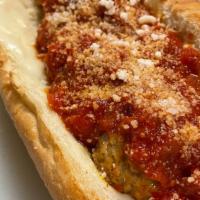Meatball Parm Sub · Roll, Toasted, Marinara, Provolone, Grated Cheese and Meatball.