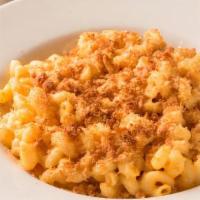 Homemade Baked Mac & Cheese · Homemade Mac and Cheese tossed in our velvety cheese sauce and baked with buttery Ritz crack...