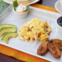 Desayuno De La Casa · Cada plato viene servido con dos huevos al gusto, plátanos fritos, frijoles y crema. / Each ...