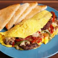 Philly Steak Omelet · Two fluffy eggs filled with shaved ribeye steak, grilled onions, and provolone cheese. Serve...