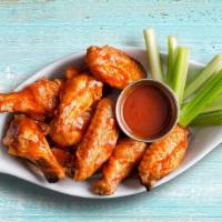 Wings Dirty Dawg · The possessed spin on wings comes with your choice of ranch or blue cheese dressing. Select ...