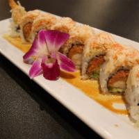 Angry Dragon · Shrimp tempura, spicy tuna, and avocado inside topped with spicy crabmeat in rita sauce.