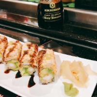 Ocean Brother Roll · Shrimp tempura and avocado roll topped with a spicy blend of lump crab meat and wasabi tobik...