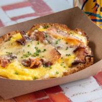 Bacon, Egg, And Cheese · Crispy organic NH bacon, scrambled PA farm eggs, and aged Cabot Cheddar.