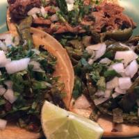 Authentic Mexican Tacos (1) · Corn tortilla tacos are gluten free. Corn tortillas filled with your choice of meat, onions ...