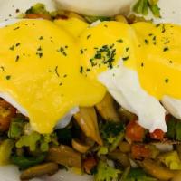 Vegetarian Benedict · With peppers, onions, mushrooms, tomatoes and broccoli.