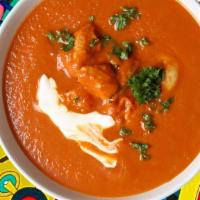 Awadhi Butter Chicken · Tender chunks of char grilled tandoori chicken in a  creamy and deliciously smooth butter, t...