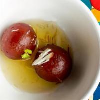 Gulab Jamun · Fried rich cottage cheese dumplings steeped in infused syrup