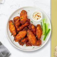 Chix Wings · Chicken wings breaded and fried until golden brown.
