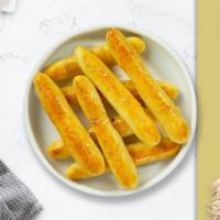 Cheesy Iconic Bread Sticks · Sticks of crisp, baked bread from Italy with cheese.