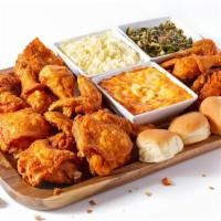 Crown Box · 21 pieces of chicken, 8 rolls, 4 mashed potatoes, 4 coleslaw,& cheese and 2L soda.