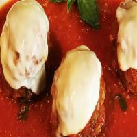 Polpette Classico · 2 large old family recipe meatballs made in our kitchen daily with a rich blend of black Ang...