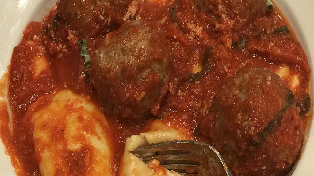 Ravioli Alla Matrimonia-Family Size (Serves 5-8) · The “Marriage” of two of our most asked for favorites—Housemade Meat Balls alongside Pasta Mamma’s Cheese Ravioli.  A Classic of the Italian Countryside.  Served with our slow simmered Rich Sunday Tomato Sauce.