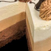 Slice-Triple Chocolate Mousse Cake · Can’t decide? 3 luxurious layers of solid mousse-milk chocolate, white chocolate and mocha m...