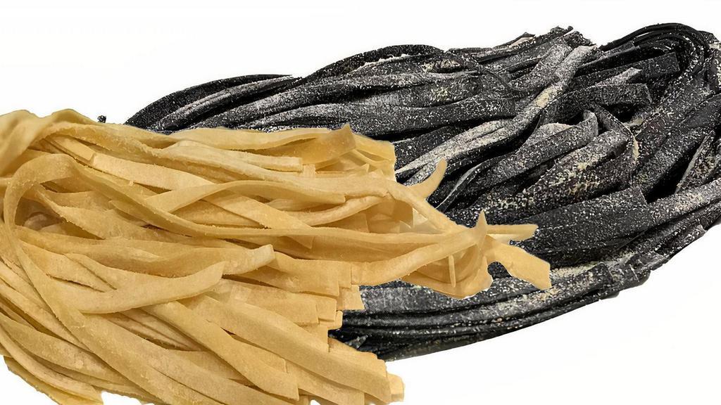 Fettuccine/Egg Or Black - Handmade (Ready To Cook) · Ready to Cook! 1 Pound per order- There is a huge taste and texture difference of Black Squid Ink Fettuccine made by hand or made by machine. Egg Fettuccine is also available.

Ingredients: Durum Flour, Full Strength Flour, Eggs, Olive Oil, (Squid Ink in Black Fettuccine)

Instructions: Refrigerate pasta immediately upon delivery. Any pasta not eaten within 2 days of delivery should be frozen. Defrost before boiling. Bring 4-6 quarts of water to a boil. Add approximately 1 to 2 Tablespoons of salt. Add pasta to boiling water and cook for 4-6 minutes.