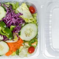 Garden Salad · Iceberg Lettuce, Tomatoes, Cucumbers, Green Peppers, Red Peppers, Carrots, Cabbage, and Pita...