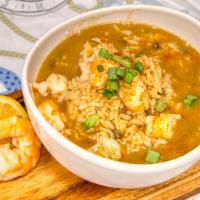 Seafood Gumbo · This delightful seafood gumbo is filled with shrimp and crab and has a nice kick. Served wit...