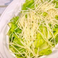 Caesar Salad · Crisp romaine lettuce with homemade caesar dressing. Topped with crunchy croutons and Parmes...