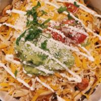 Burrito Bowl · Vegetarian. Gluten-free. Lettuce, black beans, Mexican rice, avocado, tomatoes, cheese, pico...