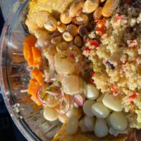 Ceviche Bowl · Gluten-free. Lettuce, corvina ceviche, sweet potatoes, peruvian corn, roasted corn, and tost...