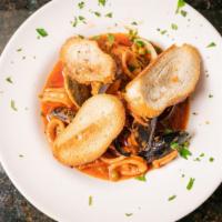 Linguini Al Frutti Di Mare · Mussels, calamari, crab meat, fresh marinara sauce.