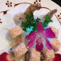 Snow Mountain Roll · Fried shrimp tempura with king crab meat on top.