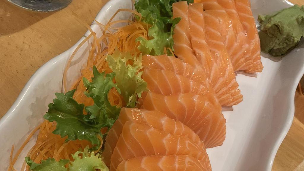 Sake (Salmon) Sashimi · Served with 3 pieces. Raw or undercooked.