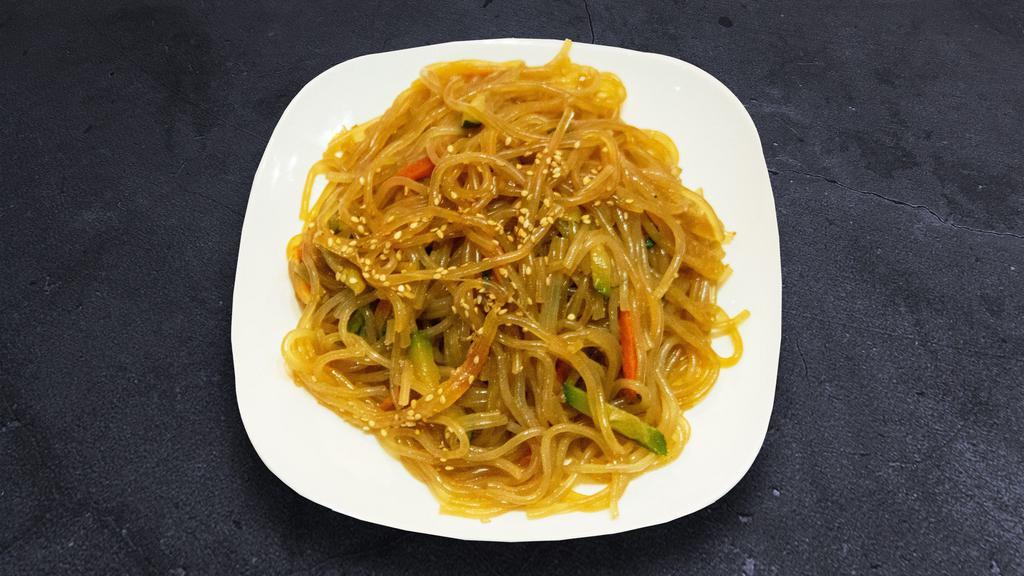 Classic Japchae · Vermicelli noodle stir-fried with beef, onion, carrot, mushroom, green onion, zucchini.