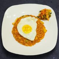 Order Kimchi · Fried rice with kimchee, spicy seasoning, and egg on top.