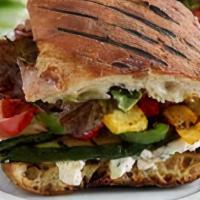 Veggie Panini · Grilled mushroom, onions, roasted peppers, tomatoes, spinach, herbs, swiss cheese.