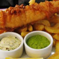 Fish & Chips · Smithwick’s beer battered fresh Alaskan cod, served with house cut fries, and a side of tart...