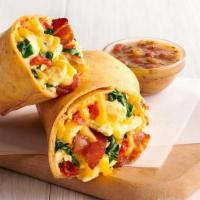 Bacon, Egg & Cheddar Breakfast Wrap · scrambled eggs, bacon, cheddar, oven-roasted tomato, spinach, tomato basil wrap