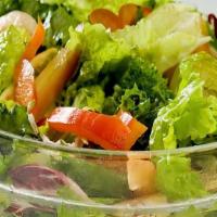 Garden Salad · Fresh and healthy garden salad, comes with dressing on the side.