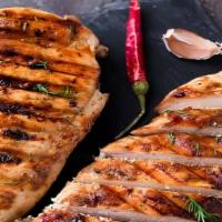 Grilled Chicken Breast Only · Juicy and tender grilled chicken breast.