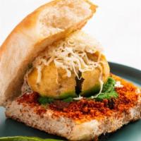 Special Cheese Vada Pav · Vada Pav topped with cheese.