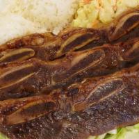 Bbq Short Rib Plate · The plate includes 1 scoop of rice and 1 scoop of macaroni salad.