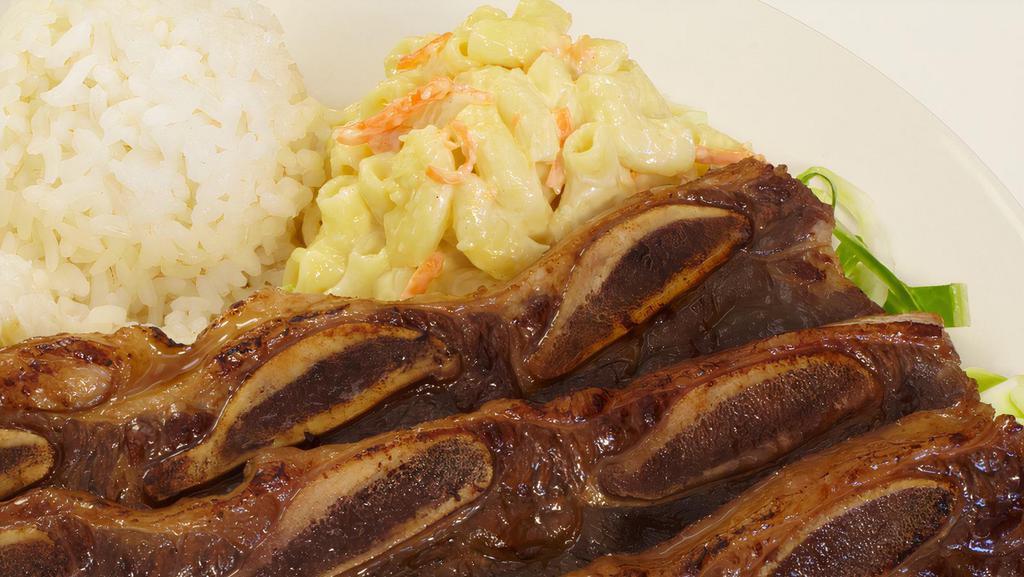 Mini Bbq Short Rib Plate · The plate includes 1 scoop of rice and 1 scoop of macaroni salad.