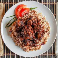 Oxtails · Comes with white rice or rice and beans and one other side