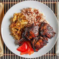 Jerk Chicken · Comes with white rice or rice and beans and one other side