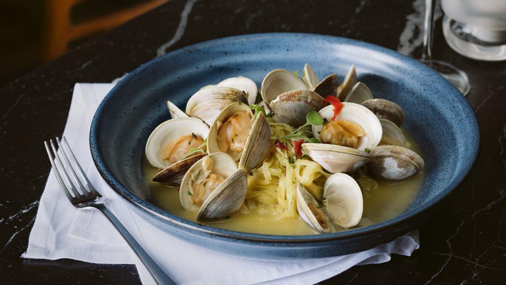 Linguine Alle Vongole · Littleneck clams, garlic butter, white wine sauce, calabrian chile.