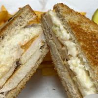 The Rachel · Oven roasted turkey breast, swiss cheese, thousand island dressing, topped with our amazing ...