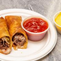 Cheeseburger Roll · Instead of Cheesesteak rolls, why not Cheeseburger Rolls?

With hint of relish to remind you...