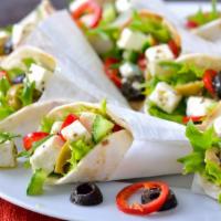 Greek Wrap · Feta cheese, black olives, grape tomatoes, cucumbers, banana peppers, red onions, and fresh ...