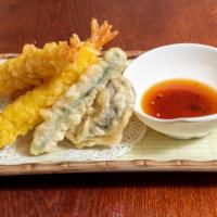 Shrimp Tempura (App) · Lightly fried battered jumbo shrimp and  veggies.