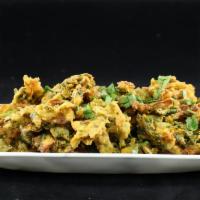 Pakodas · Crispy fried onions or spinach dipped in a chickpea and rice flour batter just like amma use...