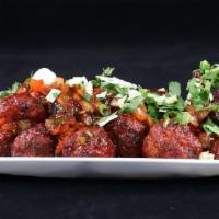 Vegetable Manchurian · Coated in a manchurian sauce made from scratch (ginger and garlic, soy sauce, chili sauces, ...
